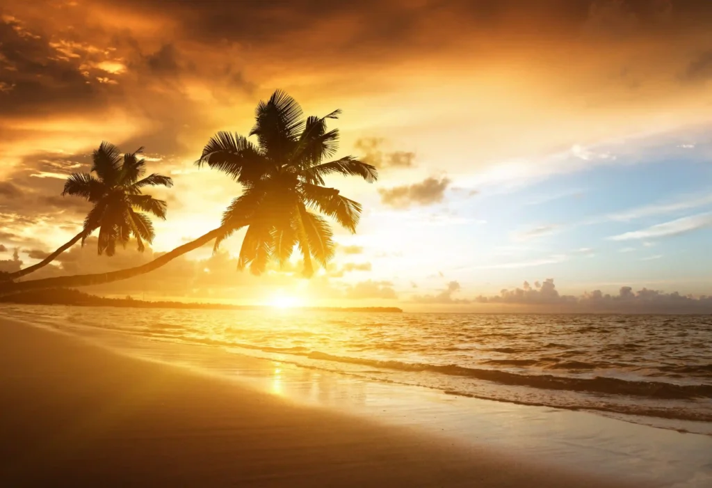 This is a blog image from Dosthi Holidays showing a beautiful beach, representing leisure travel and holiday destinations, reflecting the best taxi service in Calicut for comfortable trips.